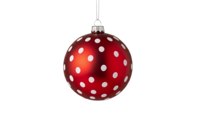 Red christmas bauble with white polka dots isolated on transparent background for festive decoration