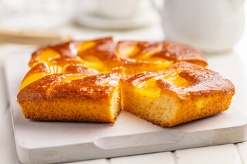 Catalana sponge cake on white table.