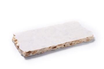 Traditional almond nougat isolated on white background