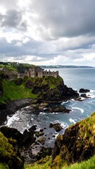 Obraz premium Rugged coastal cliffs with ruins