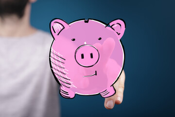 Hand holding digital piggy bank.  Savings, finance, budget, wealth.