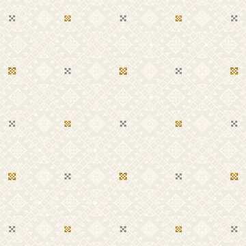 Beige colored songket pattern textile