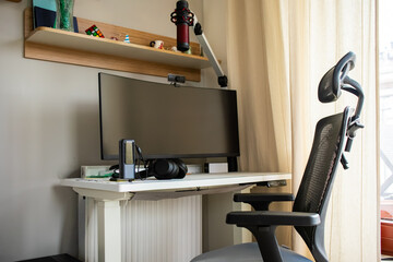 A tranquil and minimalist home office with a focus on clean lines and natural light