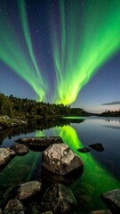 Northern Lights reflecting on a lake at night