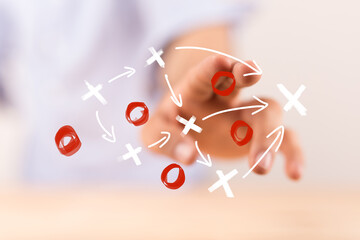 Hand pointing at a strategy plan. Business planning, success, goals.