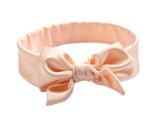 Delicate peach-colored silk headband with a large, ornate bow centered