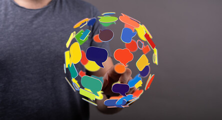 Conceptual image of a global communication network represented by speech bubbles. Shows connection, networking and modern communication methods.