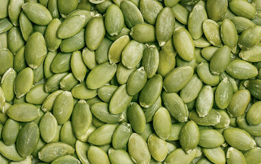 peeled dried pumpkin seeds. view from above