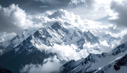 Scenic Snow Covered Mountain Peaks Under Dramatic Cloudy Sky in High Altitude Landscape with Natural Light and Majestic Appearance For Winter Theme