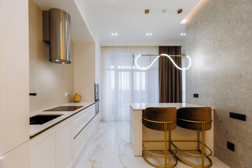 Discover the Modern Minimalist Kitchen Design that features Elegant and Stylish Bar Seating