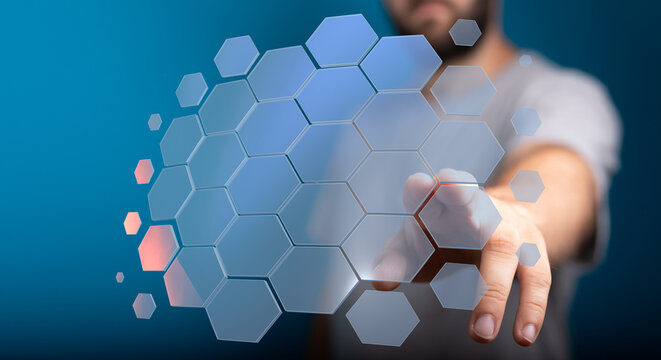 Abstract technology concept.  Man touches a digital holographic hexagon grid. Innovation, connection, future.
