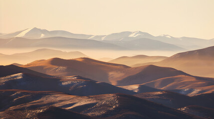 Mountain ranges under golden light