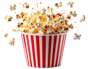 Close-up of overflowing popcorn in a classic red and white striped bucket
