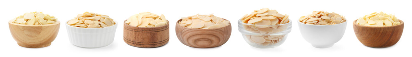 Almond slices in bowls isolated on white, set