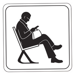 Man sitting in chair looking at phone mobile