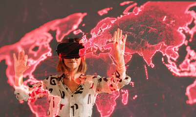 Woman using virtual reality headset with interactive world map