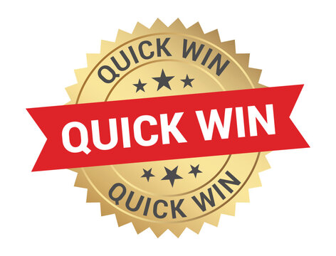 A golden badge with a red ribbon displaying the text quick win