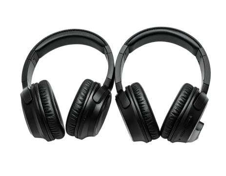 Two identical black over-ear headphones, angled, isolated on a plain black background