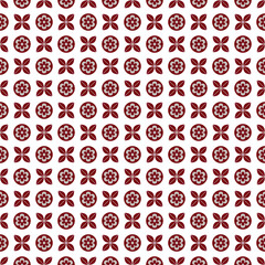 A seamless decorative tile pattern with alternating floral and leaf motifs in red on a white background, arranged in a structured grid.