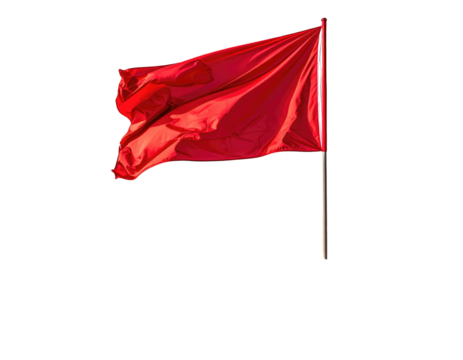 A vibrant red flag flaps in the wind against a black background