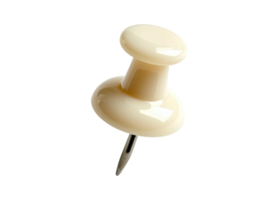 Cream-colored push pin isolated on black. Shiny head, sharp metal point