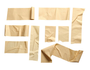 Assorted strips of beige masking tape against a black background