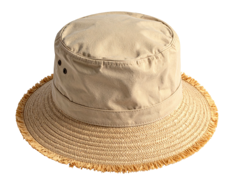 Beige bucket hat with a straw brim and decorative rivets, isolated