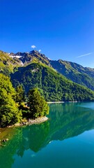Mountain lake reflecting a vibrant sky