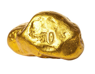 Close-up of a large golden nugget, stamped with the number 30