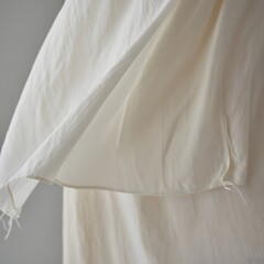 Obraz premium Close up of white fabric with soft folds and subtle textures creating a minimalist aesthetic scene