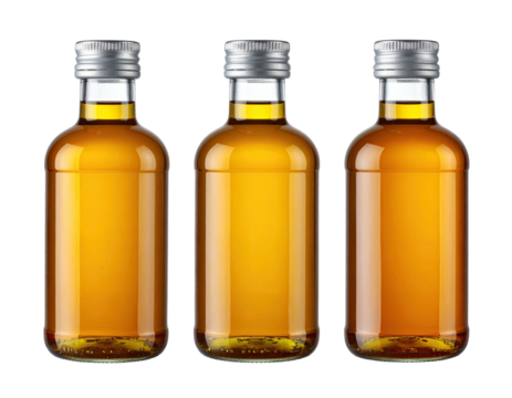 Three small glass bottles filled with amber liquid, capped with silver