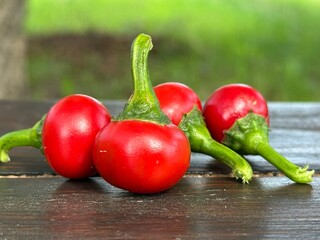 round varietal hot red peppers in table