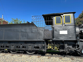 Part of an old locomotive at the railway station