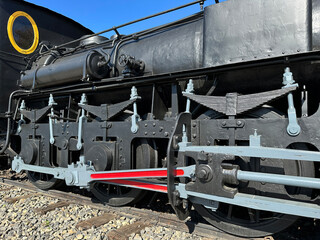 Part of an old locomotive at the railway station