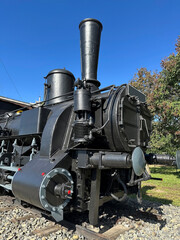 Part of an old locomotive at the railway station