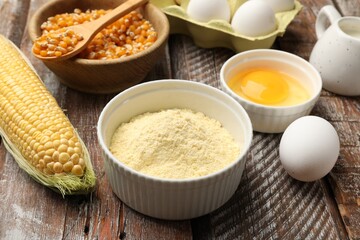 Making cornbread. Different ingredients on light blue wooden table, closeup