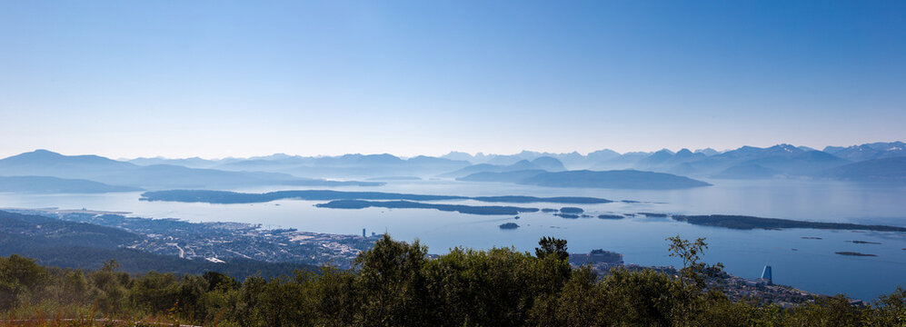 A fantastic view rom the Varden viewpoint over the Norwegian town of Molde, the fjord with the many islands and the famous panorama with over 220 peaks with most mountain tops over 1000 meters high
