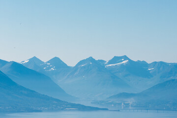 A fantastic view rom the Varden viewpoint over the Norwegian town of Molde, the fjord with the many...