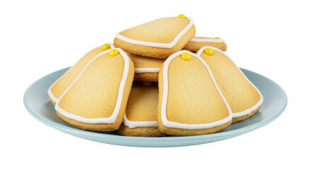 Bell-shaped sugar cookies with yellow candy isolated on a blue plate, festive holiday treat for...
