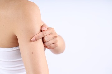 Woman with normal skin on light background, closeup. Space for text