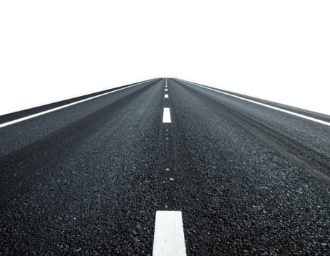 Perspective shot of an asphalt road receding into a darkened distance