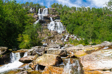 Tvindefossen is a breath-taking waterfall which has a drop of 110 metres with multiple elegant levels and is a very popular tourist attraction. Myths even say that the water is a fountain of youth. Th
