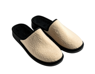 Cozy, plush, beige slippers with dark soles, offering comfort and relaxation