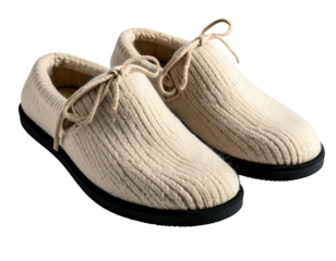 Pair of cream-colored knitted slippers with dark soles and knotted laces