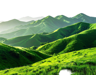 Verdant mountain ranges bathed in sunlight and filled with lush, green grass