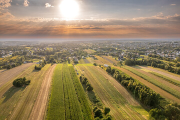Sunset Aerial of Patchwork Fields and Rural Village, Poland – Countryside Panorama