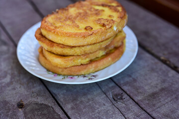 French toast  and white cheese. Rustic breakfast  made from deep fried   bread   with organic free range   eggs