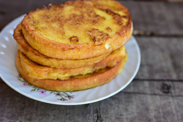 French toast  and white cheese. Rustic breakfast  made from deep fried   bread   with organic free range   eggs