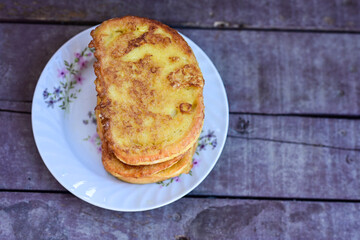 French toast  and white cheese. Rustic breakfast  made from deep fried   bread   with organic free range   eggs