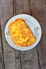 French toast  and white cheese. Rustic breakfast  made from deep fried   bread   with organic free range   eggs